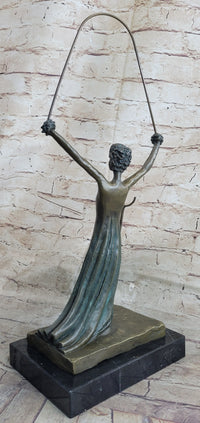 Salvador Dali Alice in Wonderland Green Patina Bronze