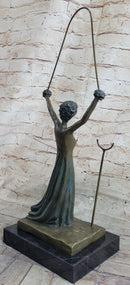 Salvador Dali Alice in Wonderland Green Patina Bronze