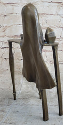 Disembodied Head Over Table - Surrealist Bronze by Dali