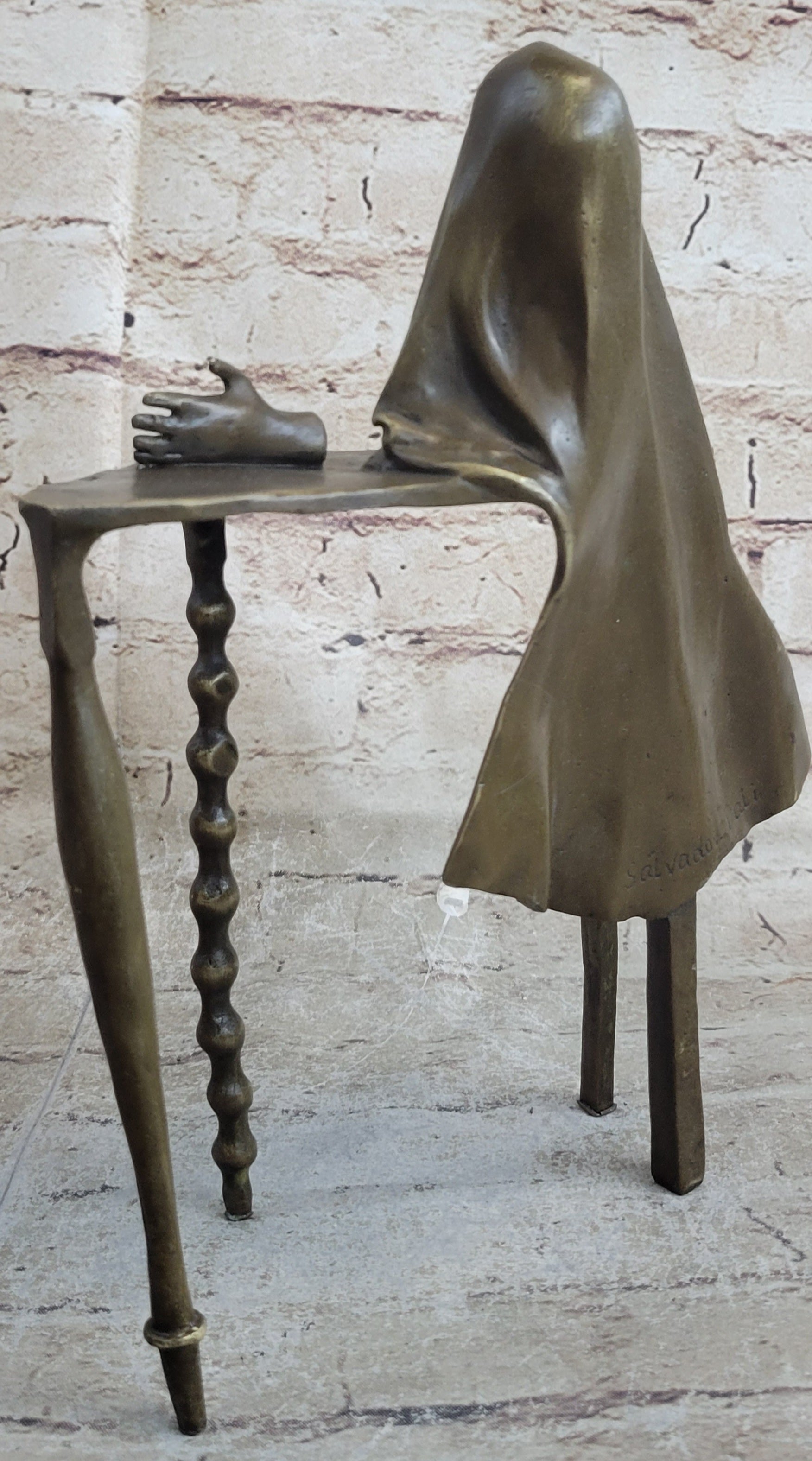Disembodied Head Over Table - Surrealist Bronze by Dali