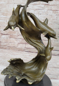 American Artist Williams Four Dolphins Swimming Bronze