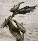 American Artist Williams Four Dolphins Swimming Bronze