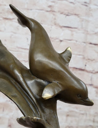 American Artist Williams Four Dolphins Swimming Bronze
