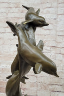American Artist Williams Four Dolphins Swimming Bronze