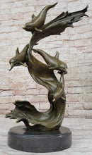 American Artist Williams Four Dolphins Swimming Bronze