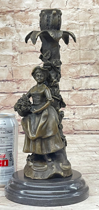 Young Woman Holding Basket of Flowers - Bronze Candle Holder