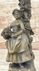 Young Woman Holding Basket of Flowers - Bronze Candle Holder