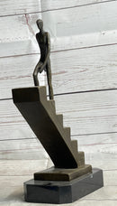 Abstract Bronze Sculpture of Man Climbing Stairs by Mario Nick