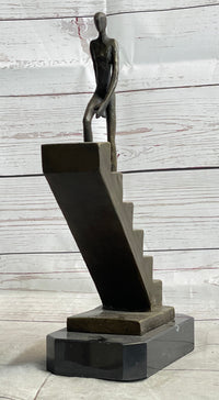 Abstract Bronze Sculpture of Man Climbing Stairs by Mario Nick