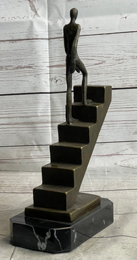 Abstract Bronze Sculpture of Man Climbing Stairs by Mario Nick