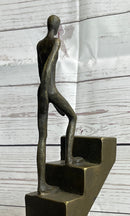 Abstract Bronze Sculpture of Man Climbing Stairs by Mario Nick