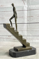 Abstract Bronze Sculpture of Man Climbing Stairs by Mario Nick