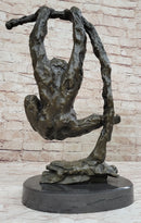 Playful Chimpanzee Swing on Bar Bronze by C. Williams