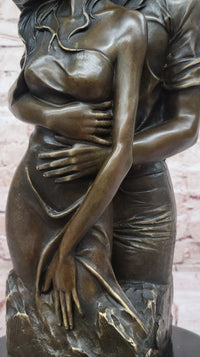 Bronze Couple Sculpture – Embrace of Love