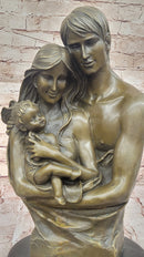Bronze Family Sculpture – Cherished Moments with Parents and Child