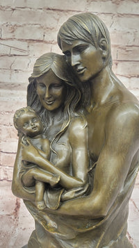 Bronze Family Sculpture – Cherished Moments with Parents and Child
