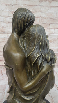 Bronze Family Sculpture – Cherished Moments with Parents and Child
