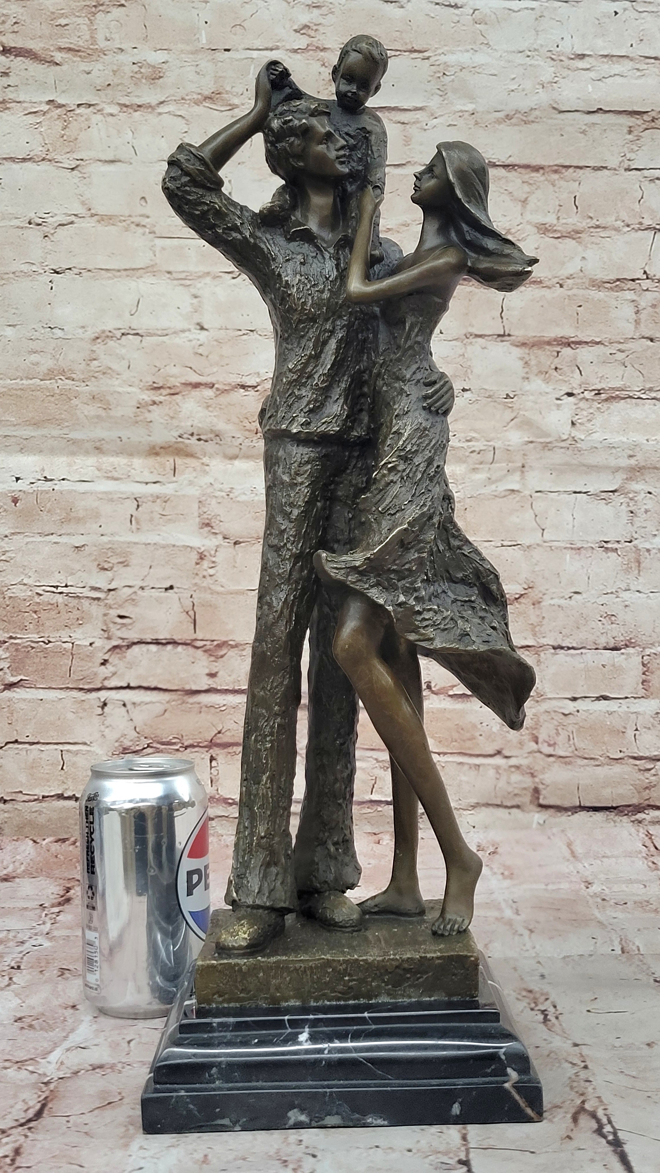 Bronze Family Sculpture – Joyful Moments with Parents and Child