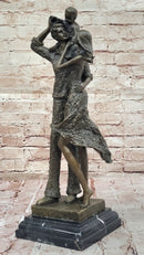 Bronze Family Sculpture – Joyful Moments with Parents and Child
