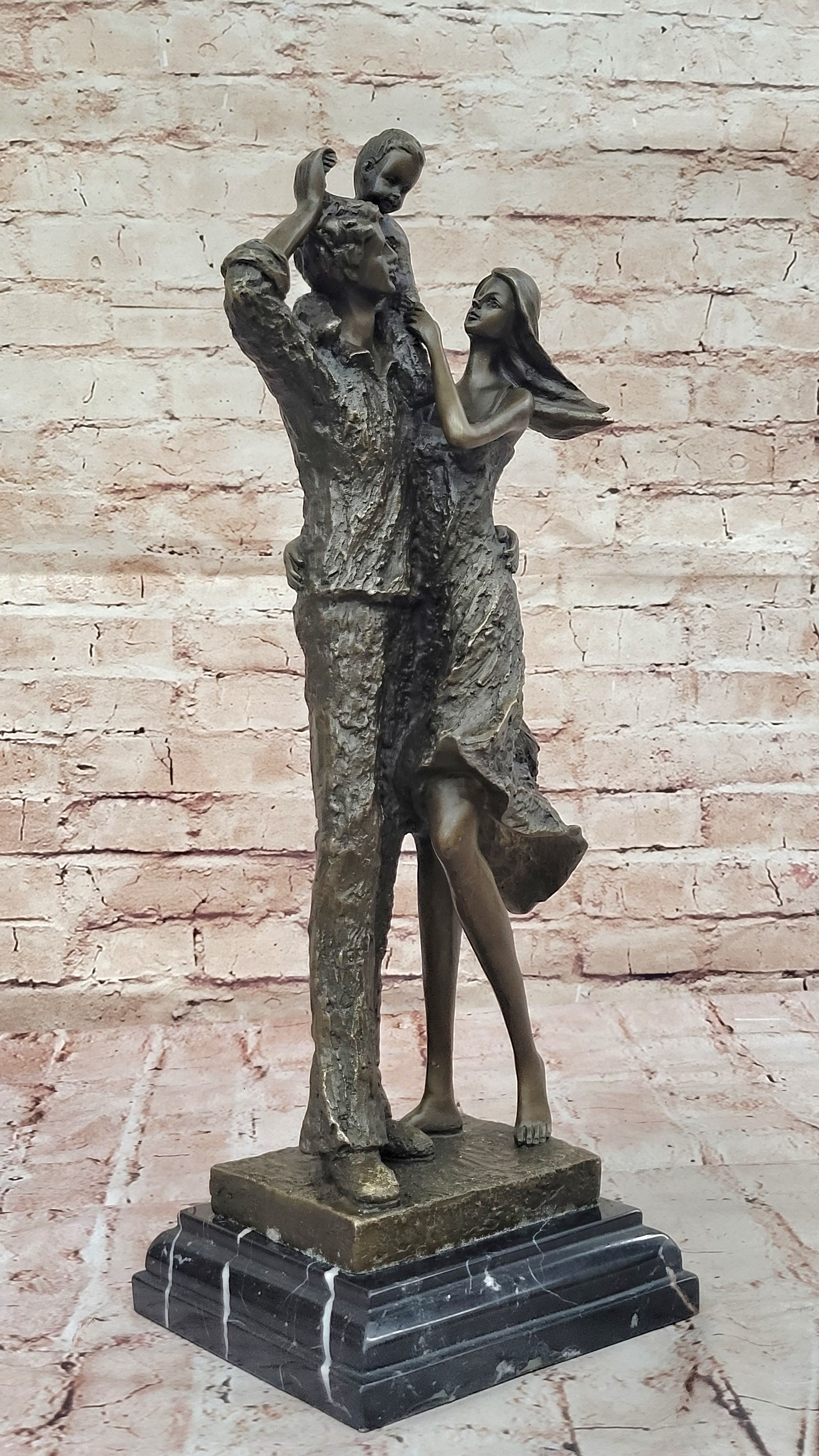 Bronze Family Sculpture – Joyful Moments with Parents and Child