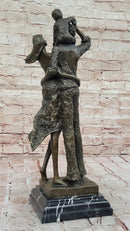 Bronze Family Sculpture – Joyful Moments with Parents and Child