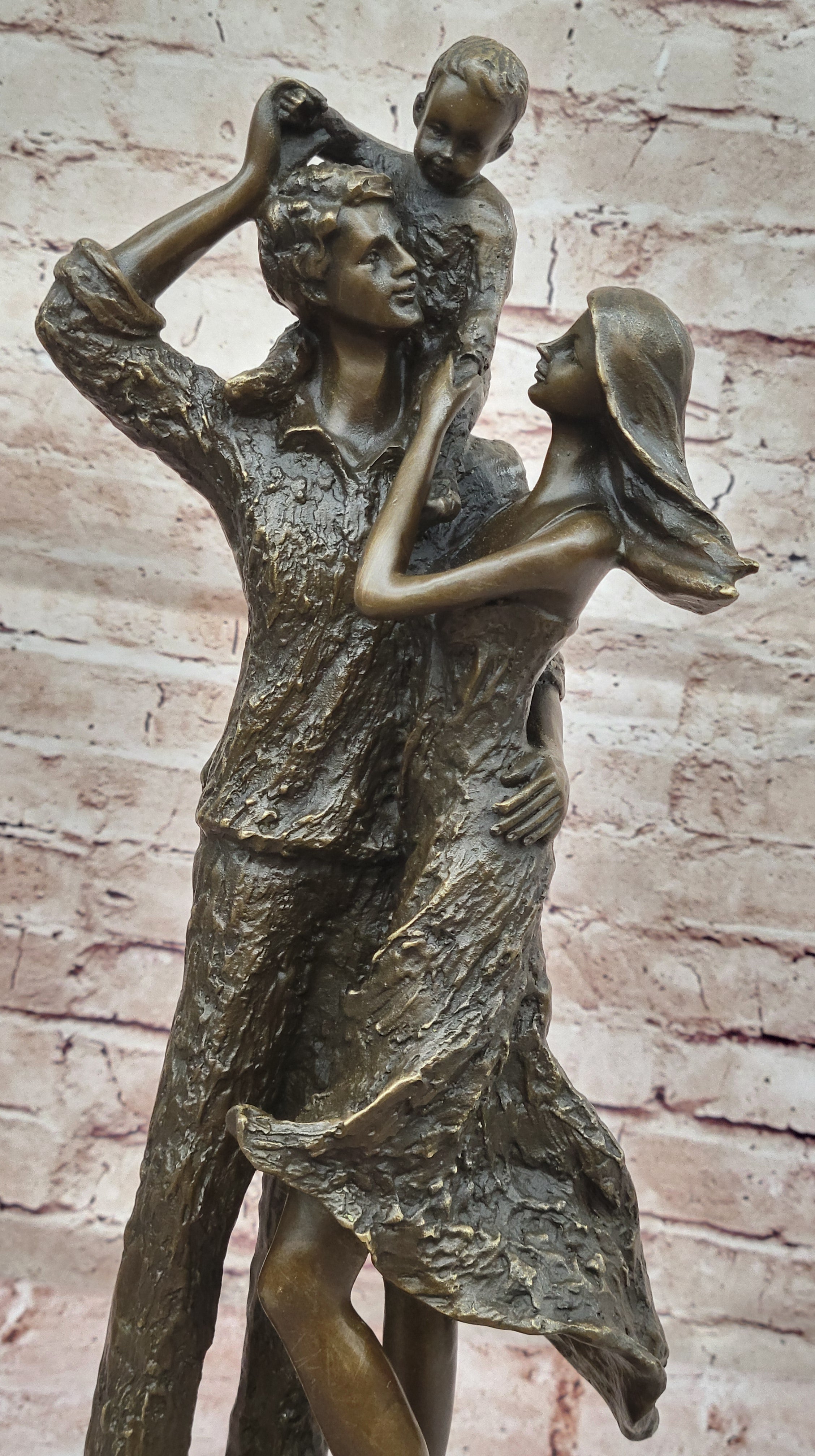 Bronze Family Sculpture – Joyful Moments with Parents and Child