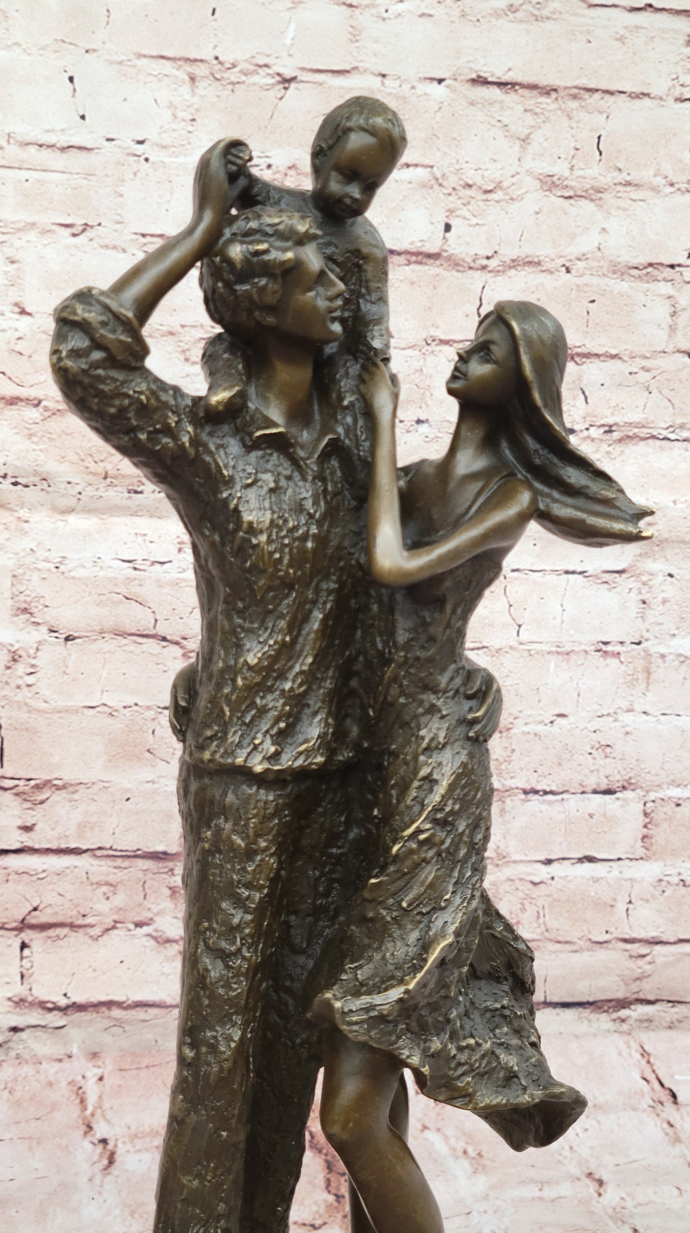 Bronze Family Sculpture – Joyful Moments with Parents and Child