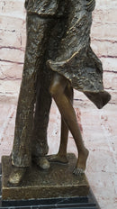 Bronze Family Sculpture – Joyful Moments with Parents and Child