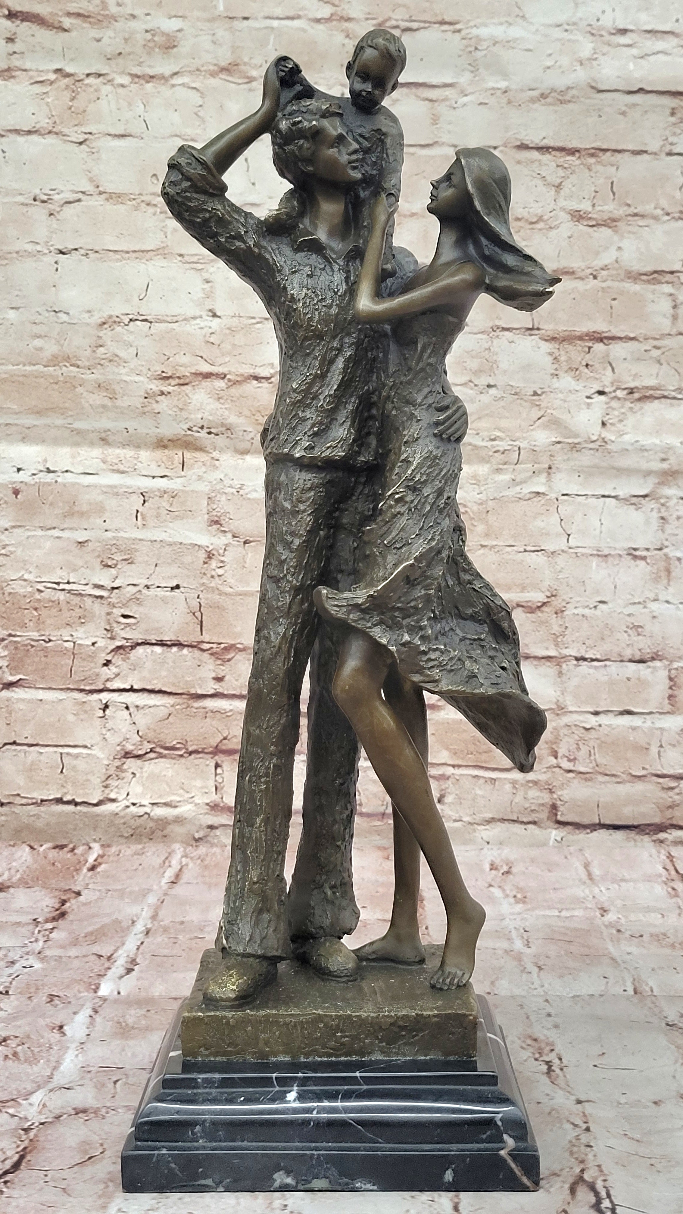 Bronze Family Sculpture – Joyful Moments with Parents and Child