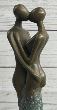 Bronze Sculpture of Kissing Embracing Romantic Couple Lovers