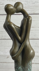 Bronze Sculpture of Kissing Embracing Romantic Couple Lovers