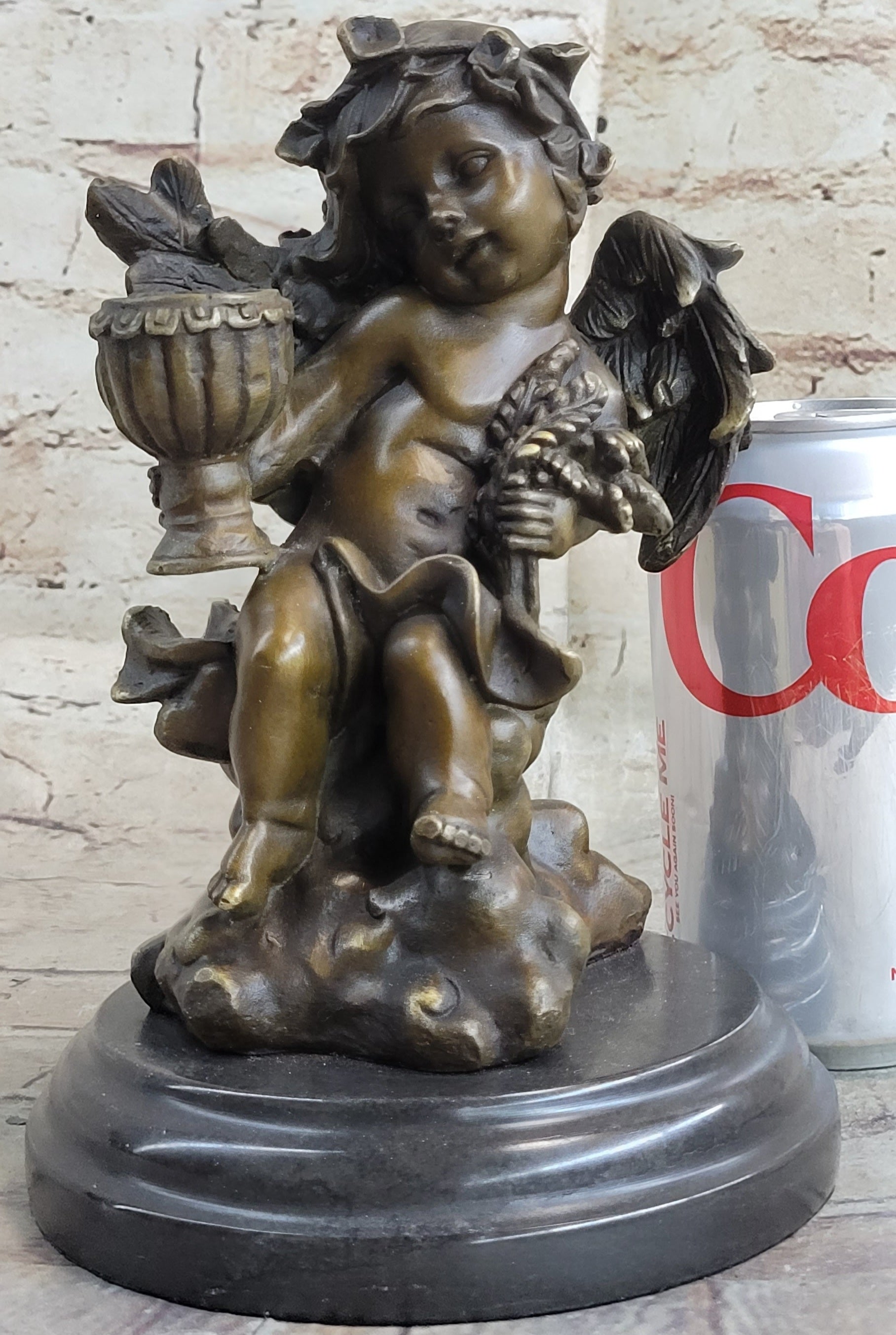 Cherub Holding Celebration Cup 8.5'' Bronze Candleholder