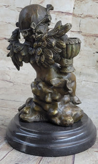 Cherub Holding Celebration Cup 8.5'' Bronze Candleholder