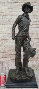 Cowboy Holding Horse Saddle - Western Art Bronze Sculpture
