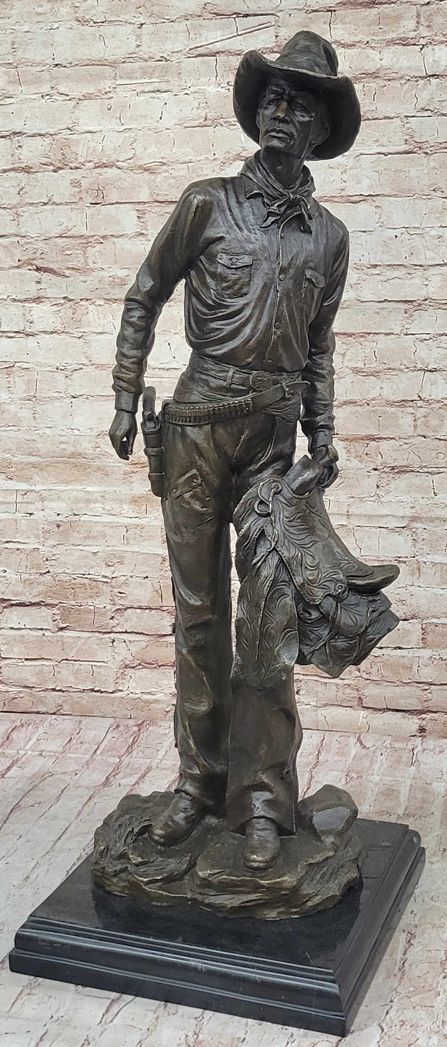 Cowboy Holding Horse Saddle - Western Art Bronze Sculpture