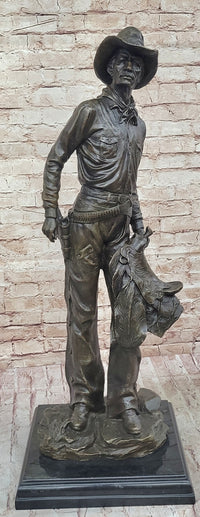 Cowboy Holding Horse Saddle - Western Art Bronze Sculpture