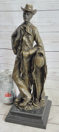 Signed Patoue Cowboy with Rope Bronze Sculpture