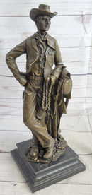 Signed Patoue Cowboy with Rope Bronze Sculpture