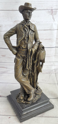 Signed Patoue Cowboy with Rope Bronze Sculpture