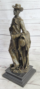 Signed Patoue Cowboy with Rope Bronze Sculpture