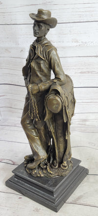 Signed Patoue Cowboy with Rope Bronze Sculpture