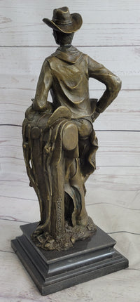 Signed Patoue Cowboy with Rope Bronze Sculpture