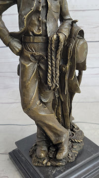 Signed Patoue Cowboy with Rope Bronze Sculpture
