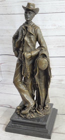 Signed Patoue Cowboy with Rope Bronze Sculpture