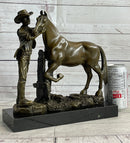 Cowboy Rancher Tending Horse Bronze Sculpture 11" x 12"