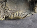 Cowboy in Chaps Holding Shovel Bronze 12" x 5"