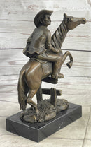 Cowboy on Horseback Hopping a Fence Bronze Sculpture