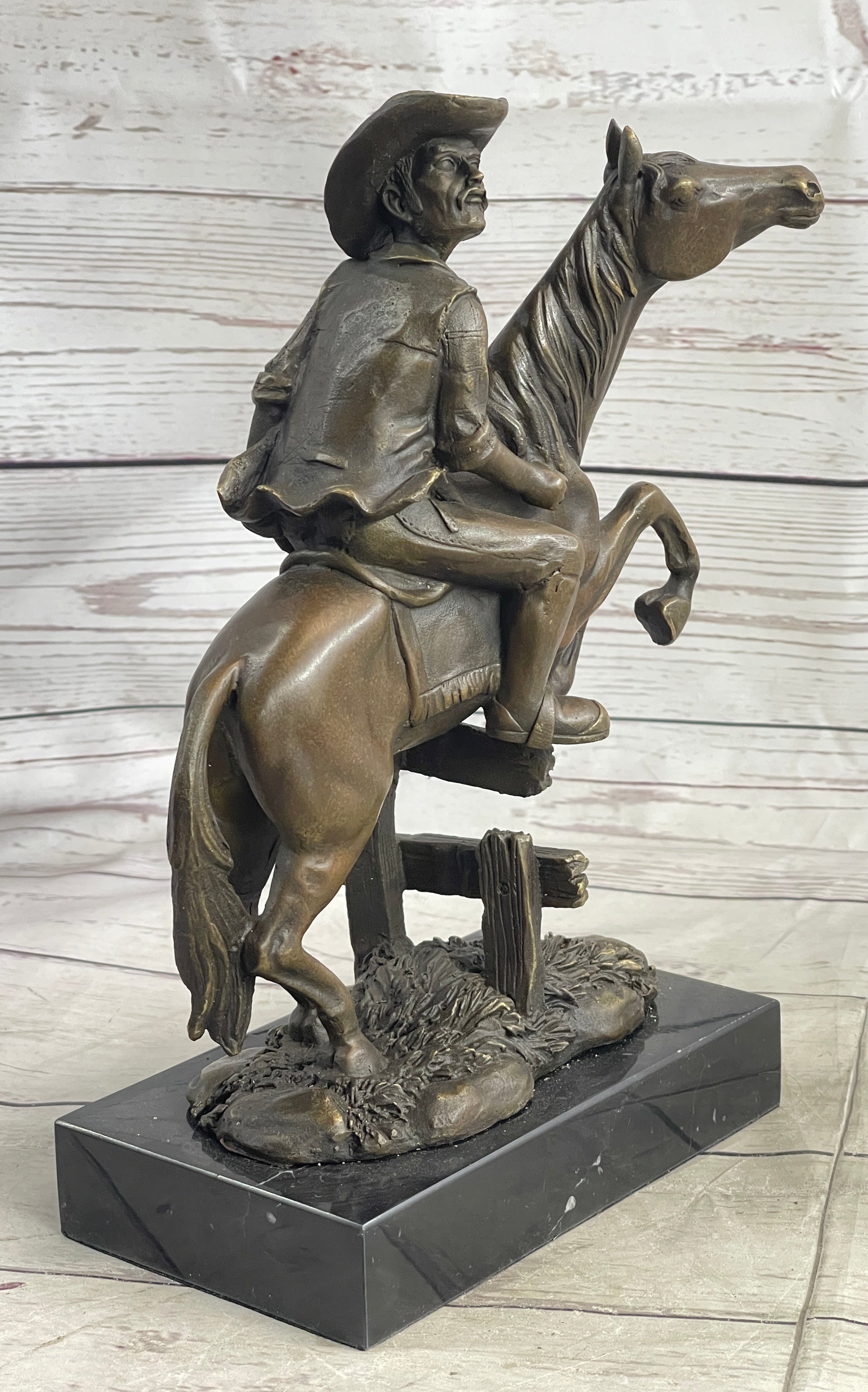 Cowboy on Horseback Hopping a Fence Bronze Sculpture