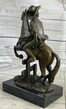 Cowboy on Horseback Hopping a Fence Bronze Sculpture