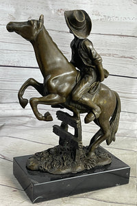 Cowboy on Horseback Hopping a Fence Bronze Sculpture